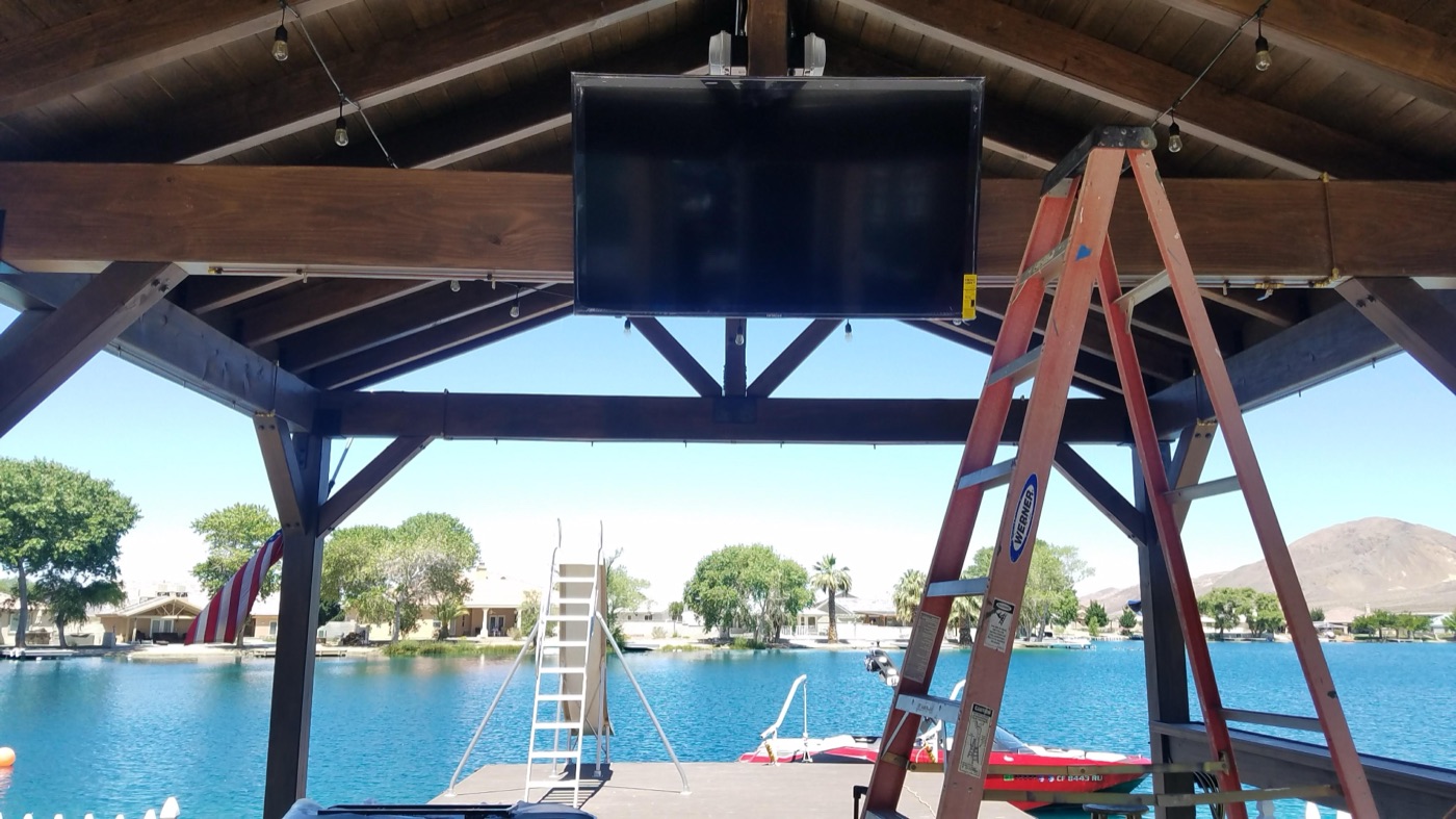 TV mounted under a covered lakeside gazebo near Henderson Nevada